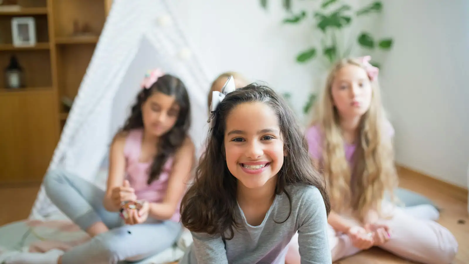 Happy mother in a playroom